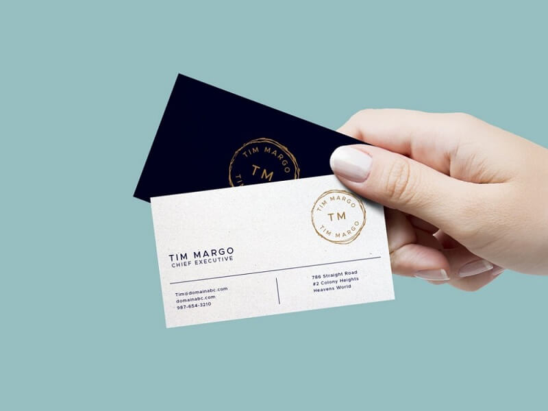 Hand Holding Business Cards